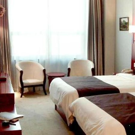 Rome Business Hotel Tiencsin Szoba fotó